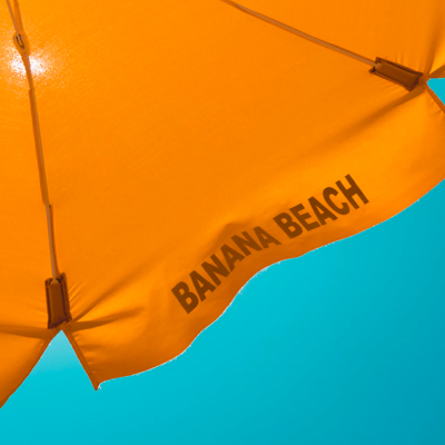 an orange umbralla on Banana beach